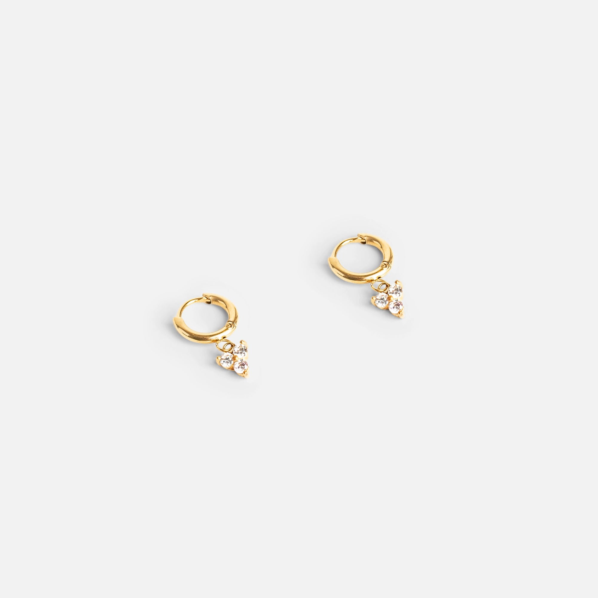 Mini golden hoop earrings with three cubic zirconia in stainless steel