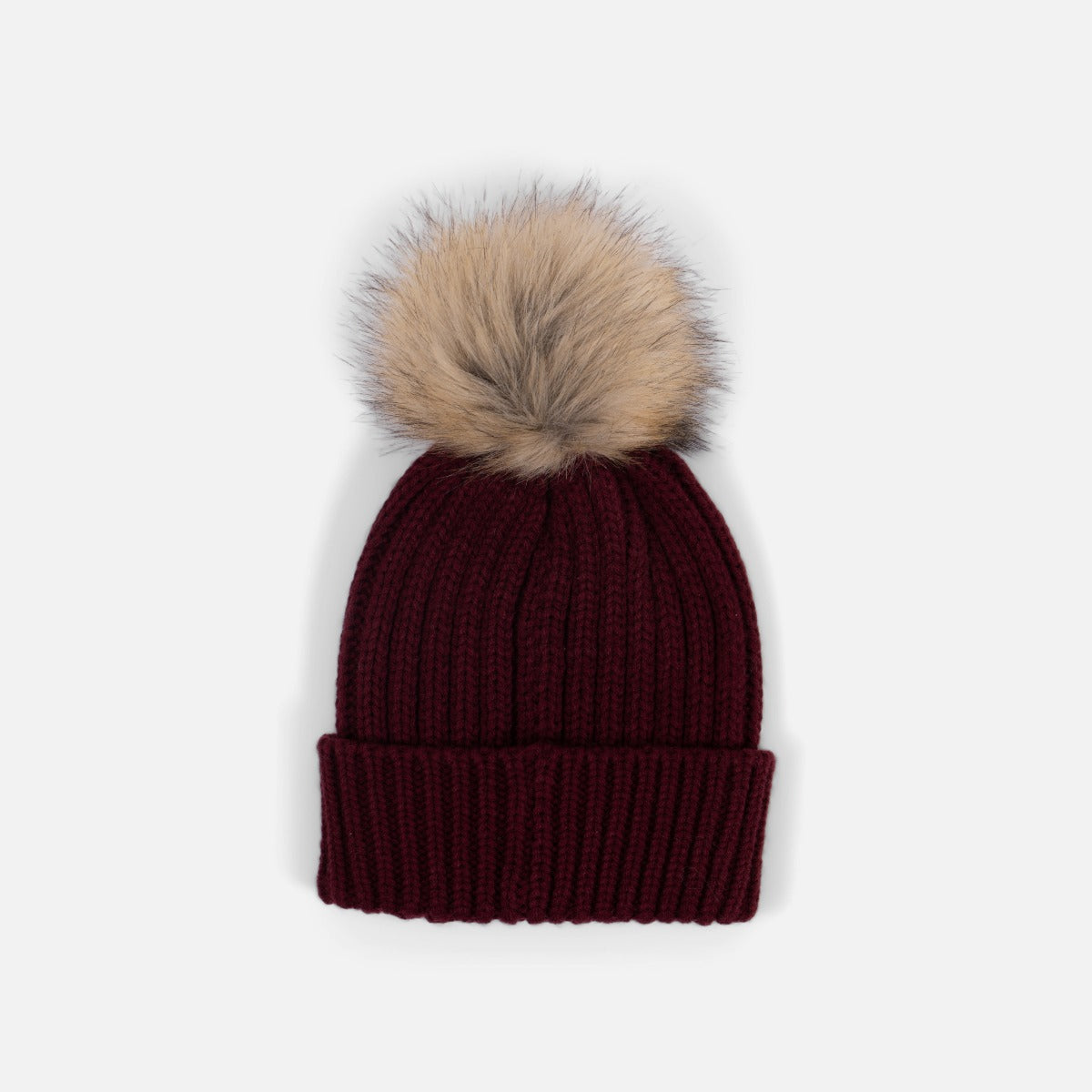 Black knit beanie with removable brown pompom
