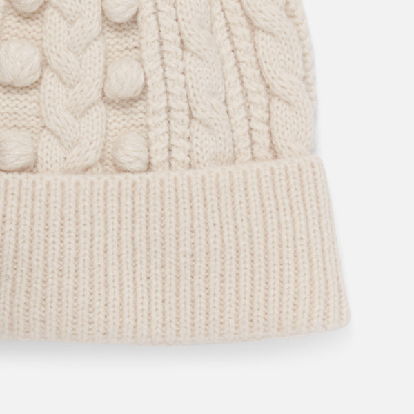 Load image into Gallery viewer, Beige polka dots knit beanie with fake-fur pompom
