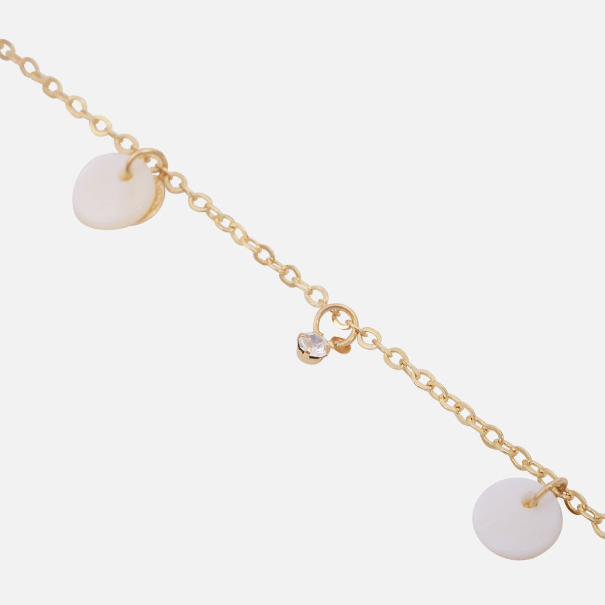Golden ankle chain with white circle charms