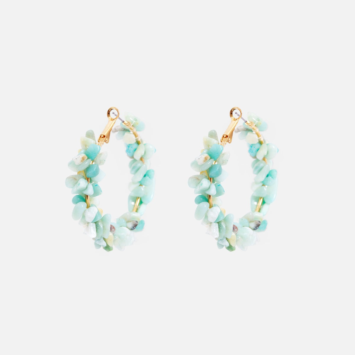 Golden hoop earrings covered with green beads 