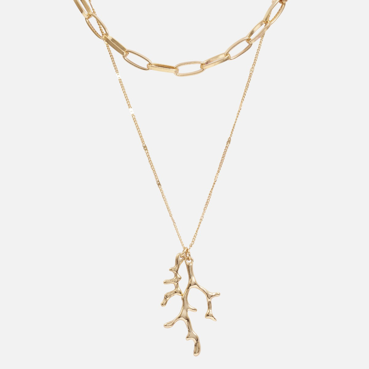 Two-chain golden pendant with seaweed charm