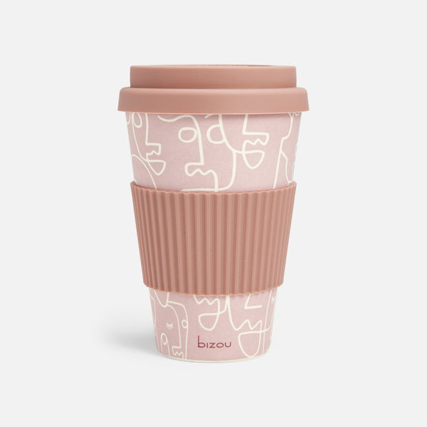 Load image into Gallery viewer, Reusable pink bamboo coffee mug with abstract faces
