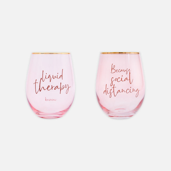 Load image into Gallery viewer, Pink wine glasses with humoristic quote; &quot;liquid therapy&quot; and &quot;because social distancing&quot;

