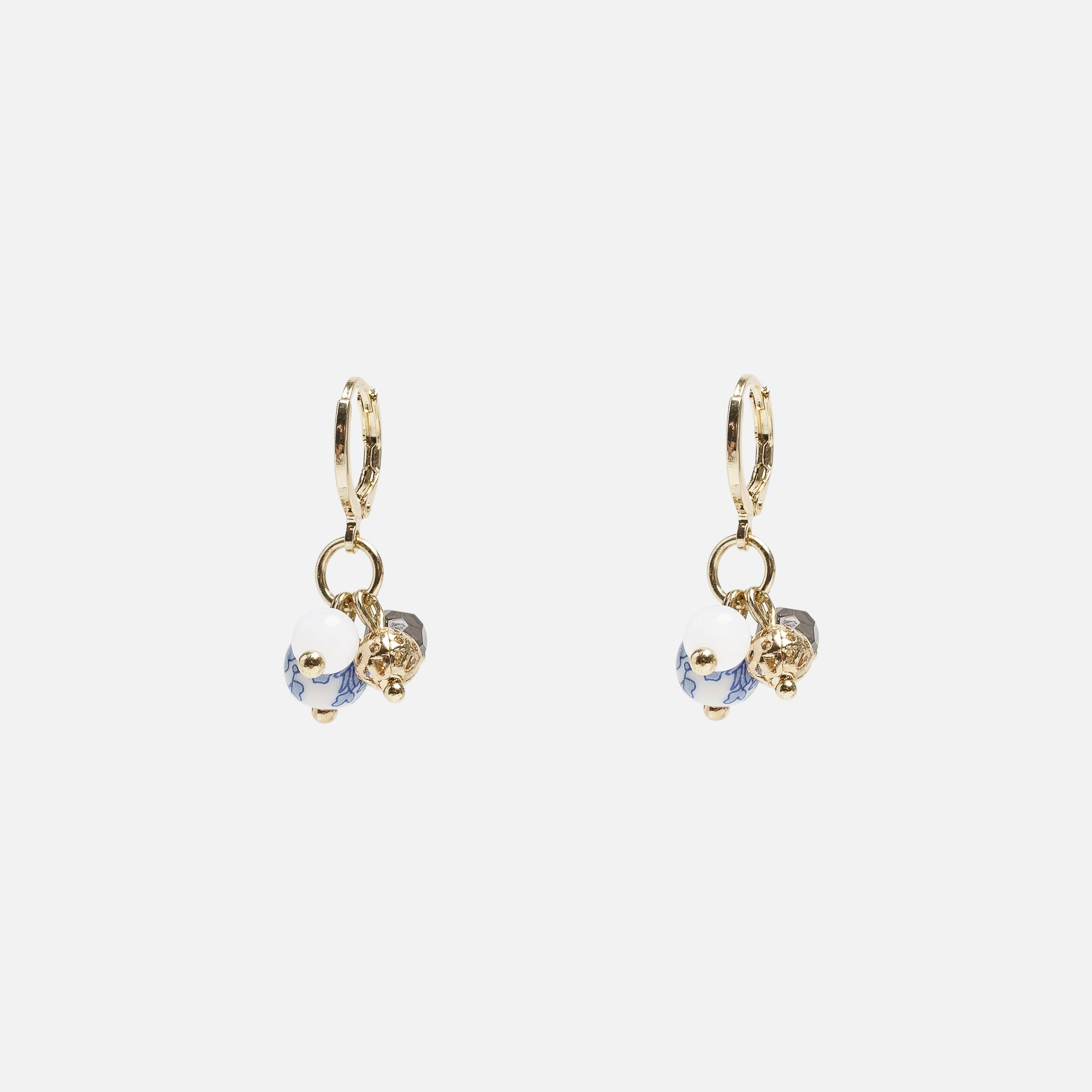 Golden hoop earrings with charms