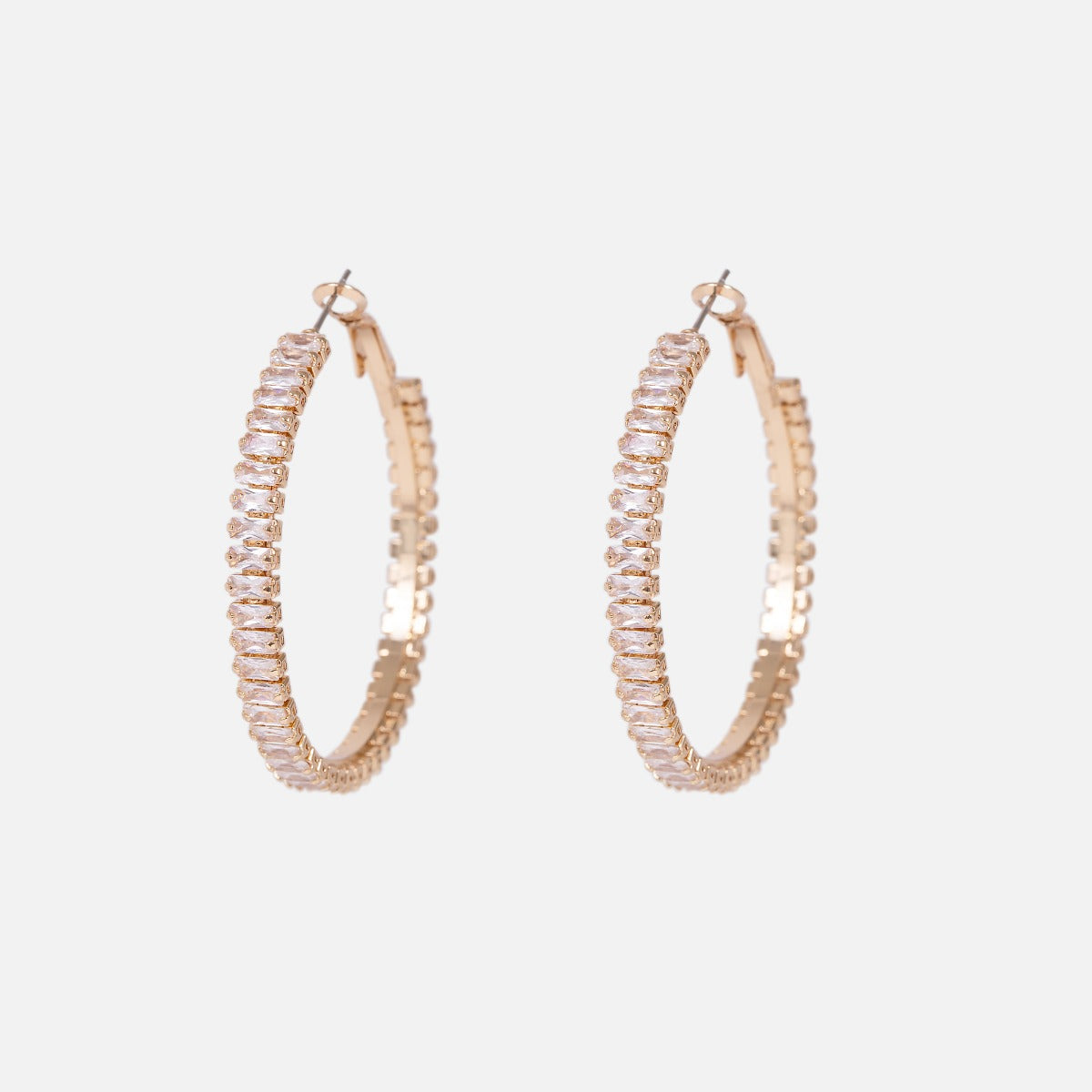 Wide golden hoop earrings with sparkling stones