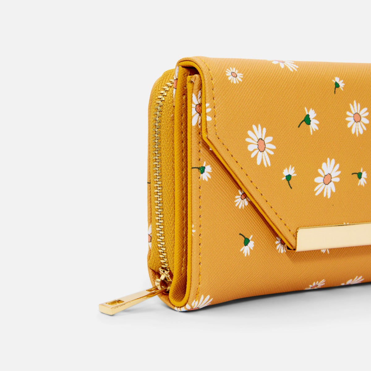 Ocher wallet with flap with golden details and white daisy print