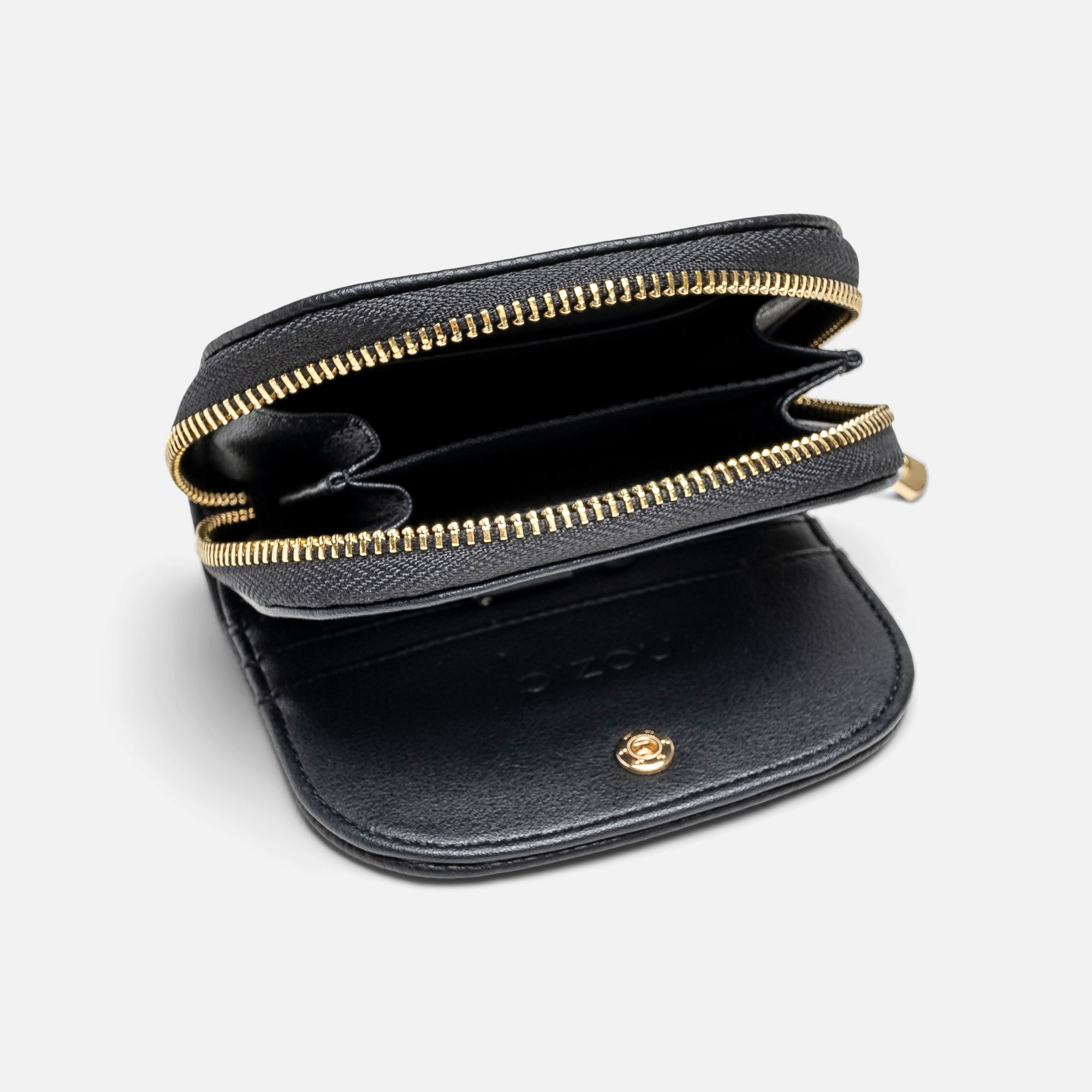 Black round shaped card holder in leatherette with gold details