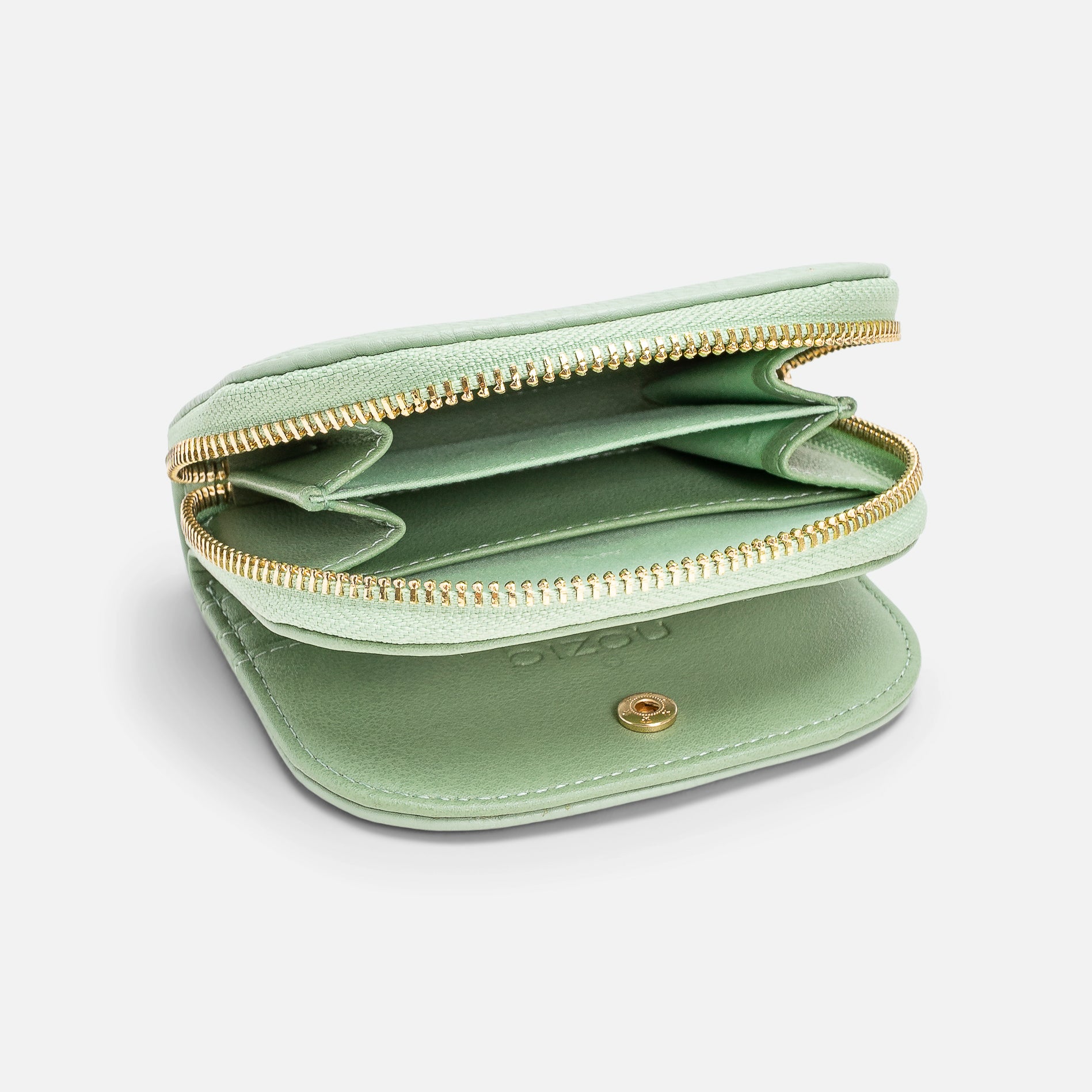 Mint round shaped card holder in leatherette with gold details