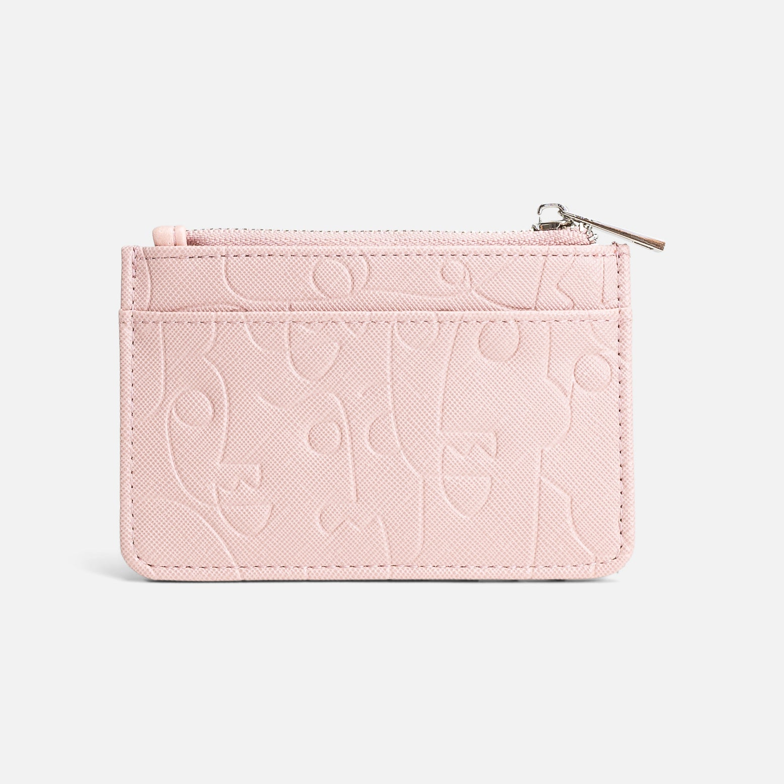 Pale pink card holder with abstract faces 